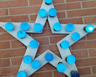 Metal star lighted sign