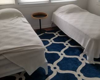 Twin beds; great rug! Adesso Crater end table
