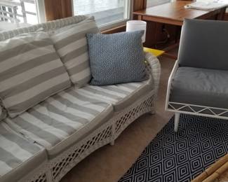 Wonderful wicker couch; area rug