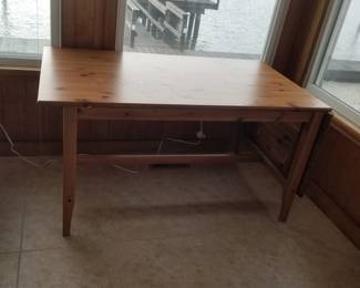 Sturdy wooden dining table with drop leaf