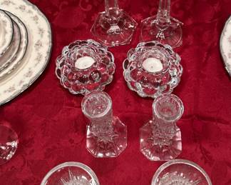 Four sets of candle holders