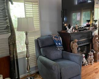 Lift chair, floor lamp, large TV.....