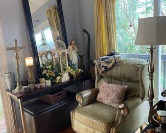 Matching full length mirror, large brass crucifix, bird house, chalk ware Jesus, leather look bench/storage, silver tone floor lamp.
