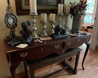 American Drew serving table, mercury glass candle holders, flower arrangement, piano bench