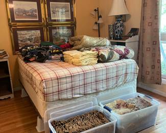 Queen bed on frame, floor lamp and table lamp, John Kollock prints(details coming soon) linens, vintage local t-shirts...