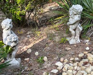 Two of 4 statues called "the 4 seasons"