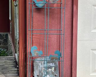 Metal vine stand and slate rock painted "welcome"