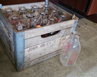 WOODEN CRATE WITH MILK BOTTLES