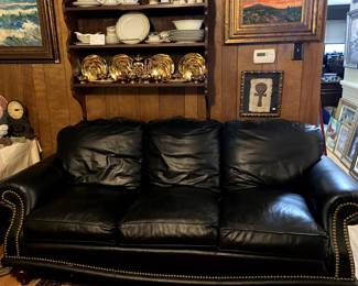 Beautiful navy leather sofa with nail head trim