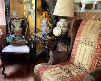 Amazing Asian inspired room divider, a couple of many side chairs, glass top table, accent pieces.