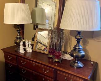 Nice dresser, Stiffel lamps, antique lamps with prisms, many mirrors.