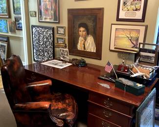 Executive desk with beautiful leather rolling chair.