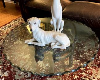 Precious MCM doggies from Italy. Beautiful wavy bevelled glass top coffee table, many rugs, tufted leather sofa.