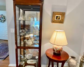 Lighted display cabinet with Lenox, Waterford and Lladro