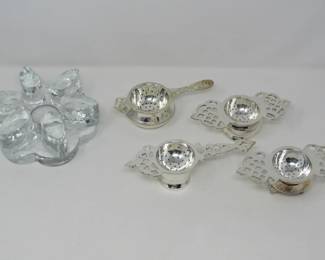 Tea strainers and votive tea base warmer