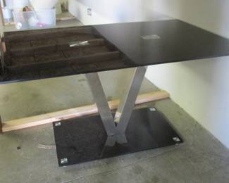 Contemporary glass top dining table
