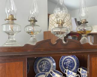 Blue willow dishes, glass oil lamps