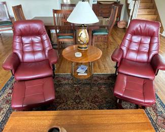 Bench Master leather chairs with ottomans; metal and wood side table 26" w x 25" t; pheasant lamp 28" t