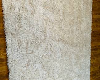 Cream shag area rug by Dynamic Rugs 87" x 64" w