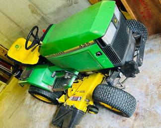 John Deere 425 tractor with mowing deck and snowblower