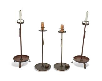 1029
Mid-20th century
Two Pairs Of Japanese Shokudai Candleholders
One pair brass, one pair patinated brass, each floor-standing candleholder with wick trimming tweezers, two with trimming receptacles, 4 pieces
Larger: 33.75" H x 13.5" Dia.; smaller: 30.5" H x 12" Dia.
Estimate: $400 - $600