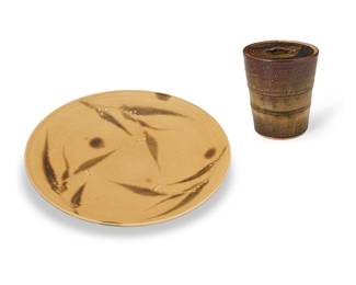 1035
Late 20th century
Two Japanese Studio Ceramic Items
Each stamped with Kanji characters to undersides and further marked with Kanji characters to box housing
Comprising one glazed studio ceramic earthenware lidded jar (7.5" H x 6.5" Dia.) and a glazed ceramic charger (20.125" Dia.) decorated with foliate motif and low relief accents, each housed original wooden box, 2 pieces
Larger box: 5.5" H x 21.5" W x 21.5" D; smaller box: 7.75" H x 8.75" W x 8.75" D
Estimate: $500 - $700