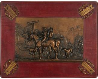1069
Late 19th/early 20th century
A Bronze Hunting Scene Plaque
The bas relief bronze depicting figures on horseback with dogs in a hunting scene, mounted on a wooden back
Including wood back: 9.5" H x 12.5" W x 0.5" D
Estimate: $200 - $400