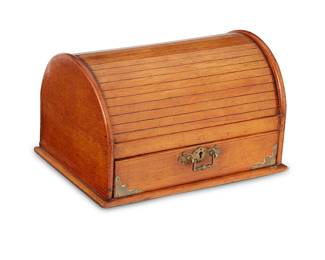 1070
19th century
A Tabletop Tambour Stationary Box
The pine wood letterbox with brass hardware, consisting of an upper portion with tambour lid revealing three interior compartments for letters and upper implement shelf with scalloped galley above a drawer with fitted interior and glass inkwell
6.5" H x 11" W x 7.875" D
Estimate: $300 - $500