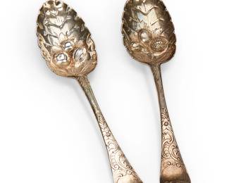 1077
1748
A Pair Of English Sterling Silver Fruit Spoons
With hallmarks for London, sterling, and date marked 1748; maker's mark: SH [Samuel Holmes]
The spoons with repoussé berries inside a leaf-form scoop, with incised acanthus scrolls, 2 pieces

Each: 8" L
4.12 oz. troy approximately
Estimate: $100 - $200