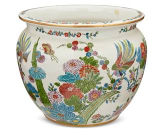 1093
20th century
A Chinese-Style Porcelain Cache Pot
Marked to the underside in red enamel bearing an apocryphal reign mark; further marked: hand-painted
The large ceramic vessel with wrap-around polychrome enameled bamboo, chrysanthemum, avian, and butterfly motifs, all with gilt accents
12" H x 13.5" Dia.
Estimate: $300 - $400