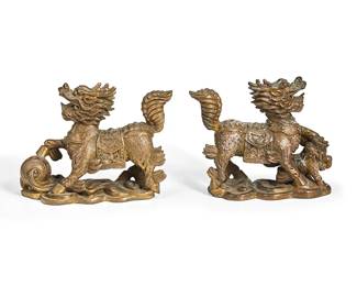 1098
20th century
A Pair Of East Asian-Style Bronze Mythical Beasts
Perhaps Qilin, each beast depicted with the attributes typical of a male and female pairing and standing on stylized cloud bases, 2 pieces
Each: 4.5" H x 6" W x 2" D
Estimate: $400 - $600