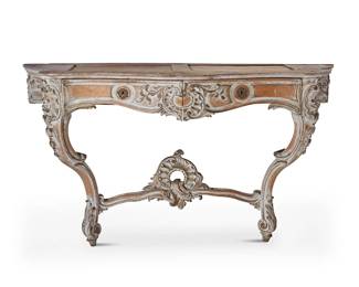 1107
Late 19th/early 20th century
A French Baroque-Style Carved Wood Console Table
Appears unmarked
The wood carcass with two inset drawers, painted white with gilt touches and carved acanthus leaf motifs throughout; set upon two scrolled legs
36" H x 60.6" W x 21" D
Estimate: $500 - $700