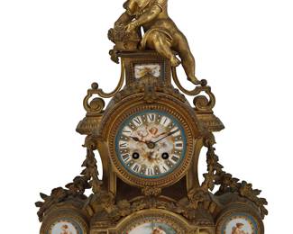 1111
Late 19th century
A French Gilt-Bronze Mantel Clock
The clock with celeste blue porcelain dial with black Roman numeral hour markers and two train movement set in a gilt-bronze case with inset porcelain plaques and surmounted by a seated putto
15.5" H x 12.25" W x 4.25" D
Estimate: $400 - $600