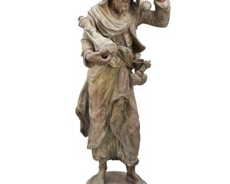 1117
20th century
A French Pottery Merchant Bronze Sculpture
Marked to the verso with a medallion: Made in France; further marked with a plaque: Marchand de Poterie
Depicting a man in Orientalist period costume vending various vessels
29" H x 8.5" Dia.
Estimate: $300 - $500