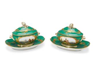 1123
19th century
A Pair Of Sevres-Style Porcelain Sauce Tureens
Each marked with blue overglaze double "L" mark
Each glazed porcelain centering reserves of castles against a green ground, each with lid and attached underplate, 2 pieces
Each: 6" H x 9.5" W x 6.5" D
Estimate: $400 - $600