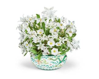 1128
20th century
A French Beaded Floral Arrangement In A Chinese Porcelain Bowl
Marked to the underside in red enamel bearing an apocryphal reign mark for Jiajing Period (1796-1820)
The bead and wire flowers and leaves affixed to woven fabric-encased and pliable "stems," affixed to a weighted substance and set in a Chinese Imperial- style porcelain bowl decorated with five-clawed dragons and flaming pearl motifs
17.25" H x 16" L x 13" D
Estimate: $400 - $600