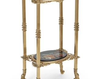 1143
Early/mid-20th century
A Continental Brass, Onyx, And Inlaid Marble Side Table
Appears unmarked
The two-tier table with cast metal alloy frame and pietra dura-style black marble shelves, each with variously colored hardstone inlay depicting a spray of roses, surmounted by four onyx and urn-shaped finials; set upon four ball-in-claw feet
36.25" H x 17.5" W x 13" D
Estimate: $500 - $700