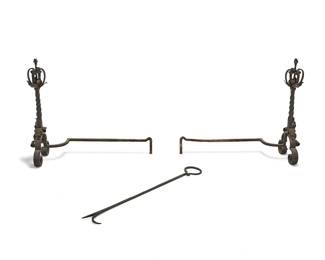 1154
Late 19th/early 20th century
A Spanish-Style Wrought Iron Andiron Set
Each large andiron with scrollwork, foliate motifs, and floral finial along with a matching handled fire poker, 3 pieces
Each andiron: 31" H x 36" W x 13" D; poker: 41" L x 5.25" W
Estimate: $600 - $800