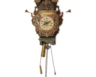 1157
Late 19th/early 20th century
A Friesian Painted Wood And Cast Spelter Wall Clock
Appears unmarked
The wall-mounted clock with a hand-painted sheet metal face with black Roman numeral hour markers and black Arabic minute markers, framed by painted cast spelter scrollwork, avian motifs, and putti masks, set in a carved and painted wood case with trumpeting mermaids flanking each side and a brass pendulum and weights
27" H x 16" W x 11" D
Estimate: $600 - $800