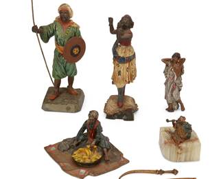 1159
Late 19th/early 20th century
A Group Of Austrian Cold-Painted Sculptures
Each appears unmarked
Comprising two cold-painted figural bronze sculptures, one mounted on an onyx base, and three polychromed spelter figural sculptures; along with two gilt painted cast bronze diminutive swords, 7 pieces
Largest: 7" H x 3.75" W x 2.25" W; smallest: 3" H x 2.75" W x 2" D
Estimate: $600 - $800