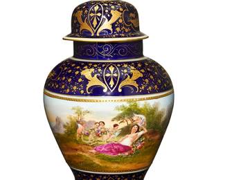 1166
Early 20th century
A Royal Vienna Porcelain Urn
Marked with blue underglaze Bindenschild (possibly for Ackermann and Fritze Volkstedt); further marked in red overglaze: Love's Offering / Love's Awakening; scene signed illegibly
The porcelain urn-form lidded vase with central register depicting Classical-style scenes with putti enclosed by gilt-highlights against a cobalt blue ground
17" H x 8.5" Dia.
Estimate: $800 - $1,200