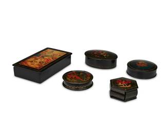 1170
20th century
A Group Of Russian Palekh Lacquered Boxes
Each appears unmarked
Comprising one large rectangular box with a hinged lid, three smaller lidded boxes, and one side-hinged and concealed hexagonal box, each all-over lacquered and depicting hand-painted scenes from Russian fairytales, 5 pieces
Largest: 1.625" H x 4.125" W x 7" D; smallest: 1.25" H x 3" W x 3.125" D
Estimate: $200 - $300