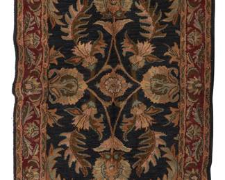 1177
Late 20th century
An Indian Agra-Style Rug
The wool-on-cotton rug with a repeating foliate pattern in hues of pink, beige, green, and blue on a black field
5' 5" L x 3' 5" W
Estimate: $200 - $400