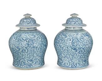 1183
20th century
A Pair Of Chinese Blue And White Porcelain Temple Jars
Each appears unmarked
Each lidded jar with all-over ornate vine and lotus scroll motifs and meandering motif banding to the shoulder and lid, rendered in blue underglaze on a white ground, 2 pieces
Each: 12.5" H x 10" Dia.
Estimate: $300 - $500