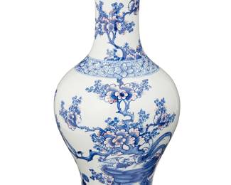 1185
Mid/late 20th century
A Chinese Blue And White Porcelain Vase
Marked to the underside in blue underglaze bearing an apocryphal reign mark for Kangxi Period (1622-1722)
The baluster form ceramic vase decorated with all-over avian and foliate motifs in blue underglaze and dotted pink glaze accents on a white glazed ground
14" H x 6.5" Dia.
Estimate: $300 - $500