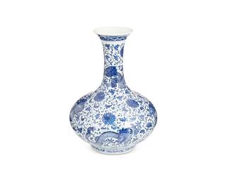 1187
20th century
A Chinese Blue And White Porcelain Stick Neck Vase
Marked to the underside in blue underglaze bearing an apocryphal reign mark for Qianlong Period (1736-1795)
The modified Tianqiuping form vase with all-over dragons and lotus scroll motifs
16.5" x 9.5" Dia.
Estimate: $300 - $500