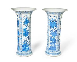 1188
20th century
A Pair Of Blue And White Porcelain Sleeve Vases
Each appears unmarked
Each modified gu-form vessel with all-over decoration in blue underglaze depicting four registers of foliate scenes with birds and butterflies, each demarcated by linear scroll motifs, on a white ground, 2 pieces
Each: 18.75" H x 10" Dia.
Estimate: $200 - $300