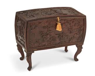 1190
20th century
A Chinese Carved Wood Chest
With haute-relief carving depicting a battle scene and a single drop-front door revealing a fitted interior with two shelves and raised on figural dragon legs
25" H x 28.75" W x 14.5" D
Estimate: $200 - $400