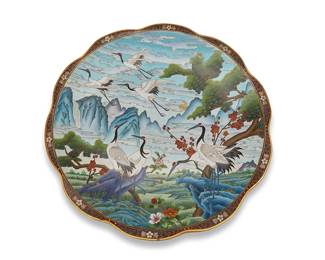 1195
Mid/late 20th century
A Chinese Cloisonné Charger
Appears unmarked
The polychrome enamel and brass charger depicting mountainous lakeside scene with seven red-crowned cranes on the recto, framed by a scalloped edge, and floral motifs to the turquoise enameled verso
2.5" H x 20.5" Dia.
Estimate: $300 - $400