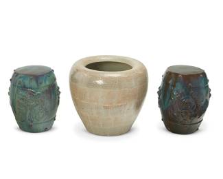1203
Late 20th century
A Group Of Ceramic Patio Items
Comprising a large globular planter with allover banded cerulean snakeskin motif and two Chinese-style barrel shaped stools glazed in the manner of flambé, 3 pieces
Planter: 18.75" H x 22" Dia.; each stool: 17" H x 14.5" Dia. approximately
Estimate: $400 - $600